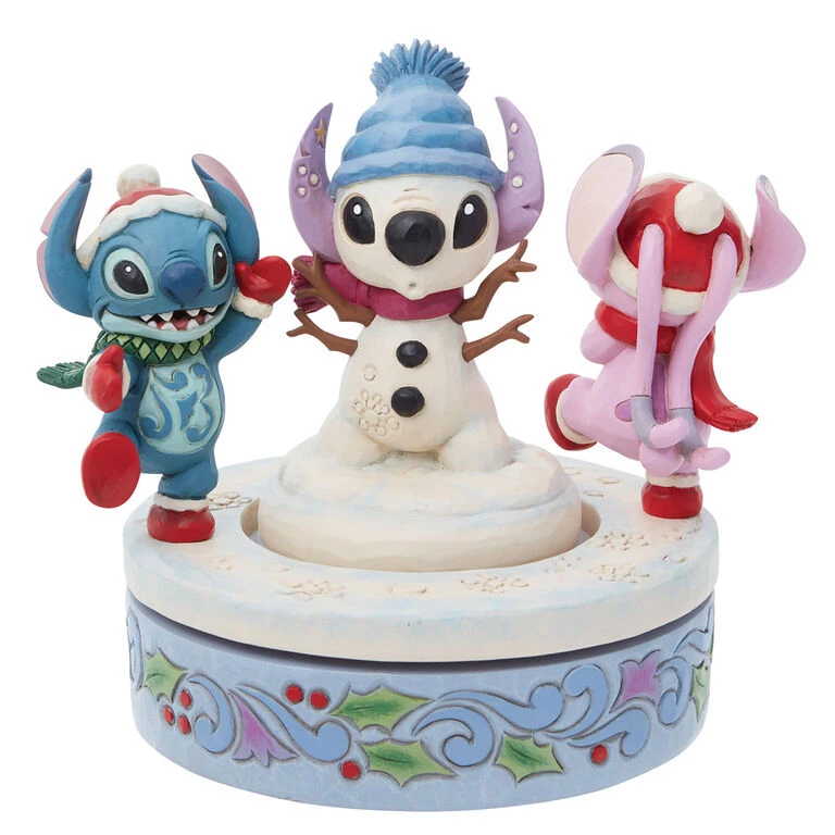 Enesco Jim Shore Disney Stitch And Angel Build A Snowman Rotating Figurine, 6" 1 Enesco Jim Shore Disney Stitch And Angel Build A Snowman Rotating Figurine, 6"