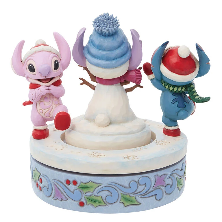 Enesco Jim Shore Disney Stitch And Angel Build A Snowman Rotating Figurine, 6" 2 Enesco Jim Shore Disney Stitch And Angel Build A Snowman Rotating Figurine, 6" - Image 2